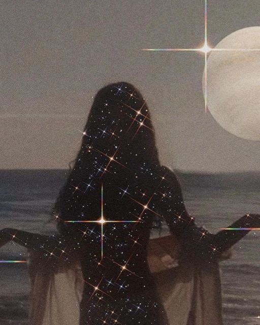 A woman standing at the shore beneath a full moon, her silhouette scattered with points of light